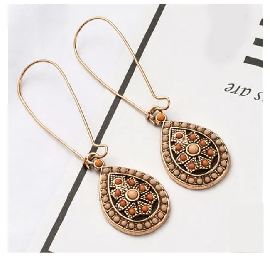 02 Earrings E1579 Gold Bead Decorated Earrings