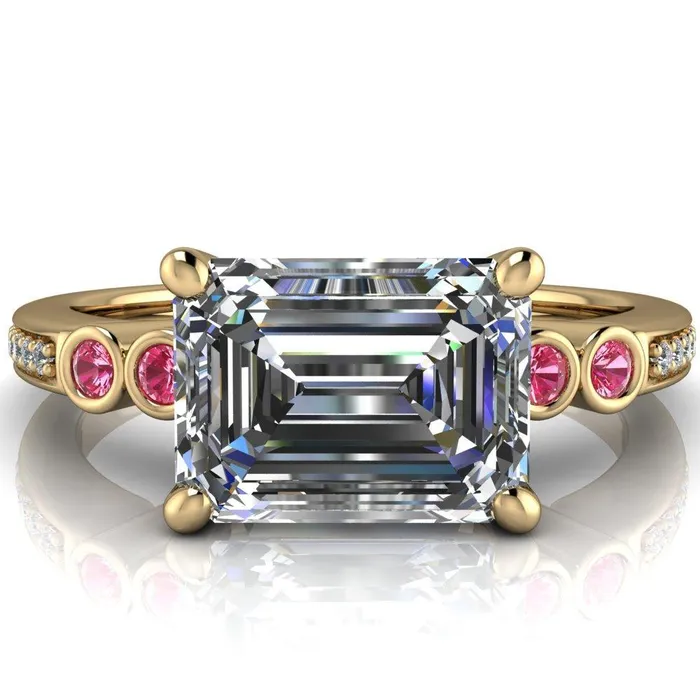Fire Brilliance Rings Philippa Emerald Moissanite 4 Pink Sapphire Sides 4 Prong Under Bezel Multi Stone Engagement Ring