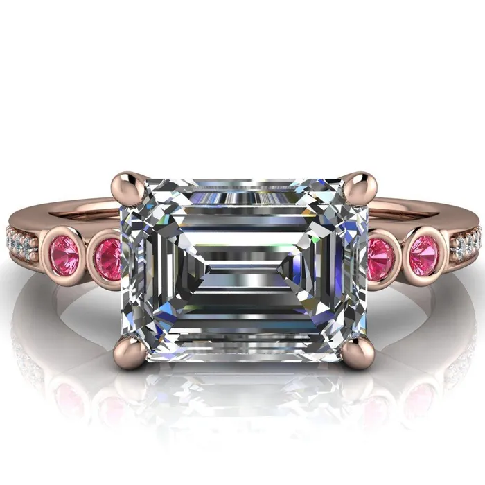 Fire Brilliance Rings Philippa Emerald Moissanite 4 Pink Sapphire Sides 4 Prong Under Bezel Multi Stone Engagement Ring
