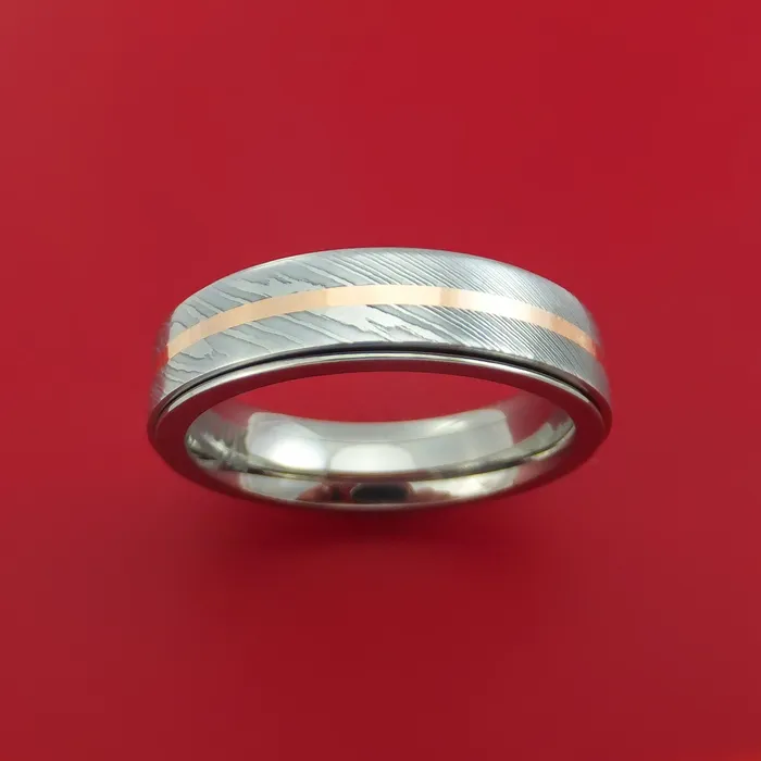Lashbrook Titanium Spinner Ring with Damascus Steel and 14k Rose Gold Inlays Custom Made Band Rings Lashbrook Titanium Spinner Ring with Damascus Steel and 14k Rose Gold Inlays Custom Made Band Rings