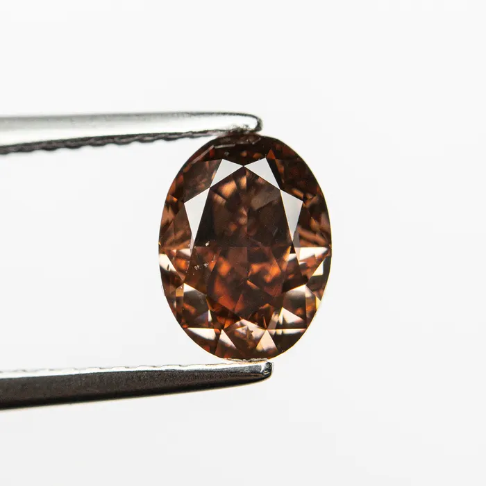 Rings Misfit Diamonds 150ct 769x574x416mm GIA SI1 Fancy Deep BrownPink Oval Brilliant 2416101